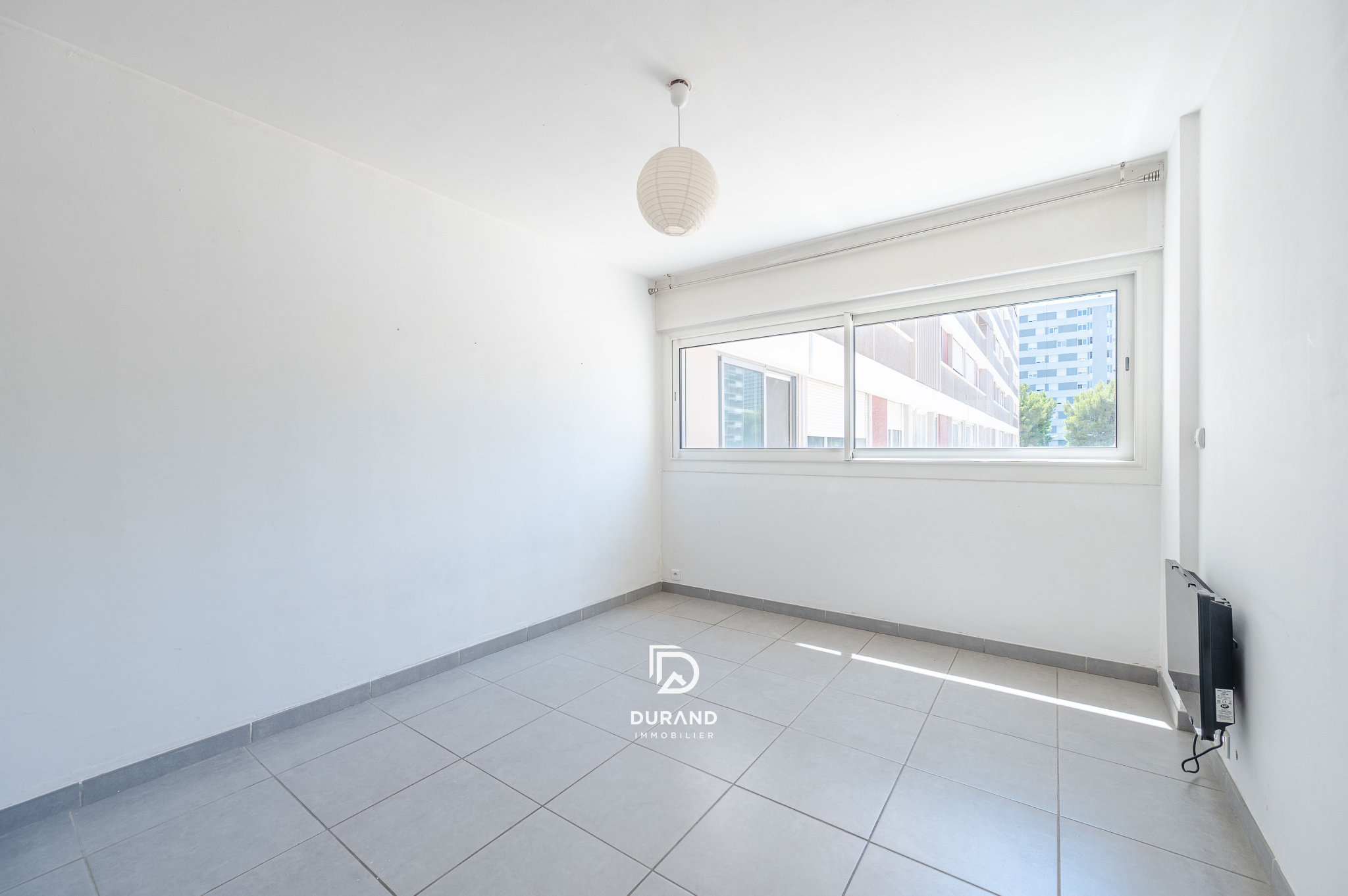 T3 traversant avec balcon et parking privatif