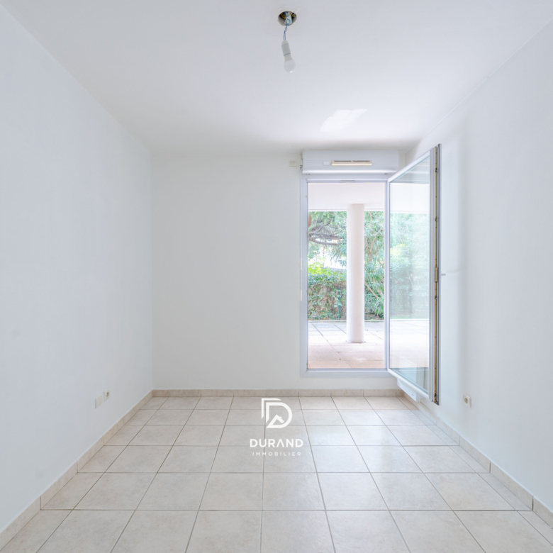 APPARTEMENT - REZ DE JARDIN - 13009