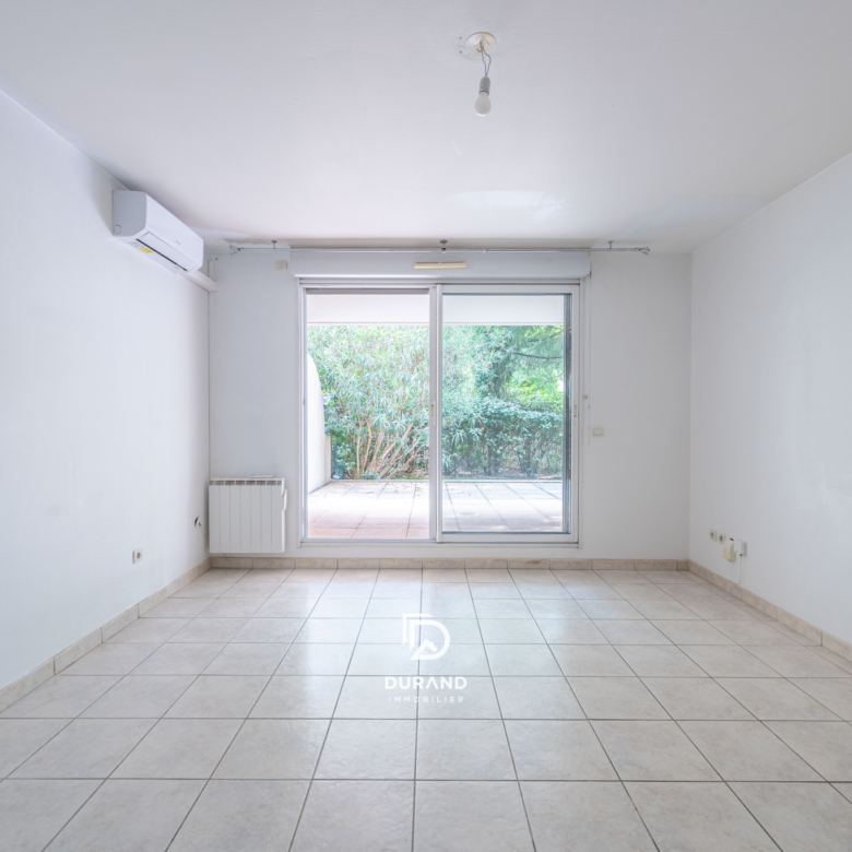 APPARTEMENT - REZ DE JARDIN - 13009