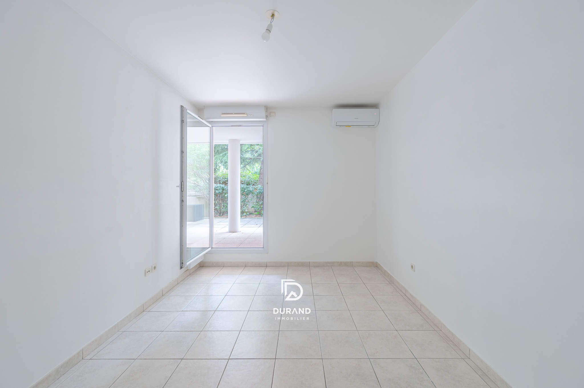 APPARTEMENT - REZ DE JARDIN - 13009